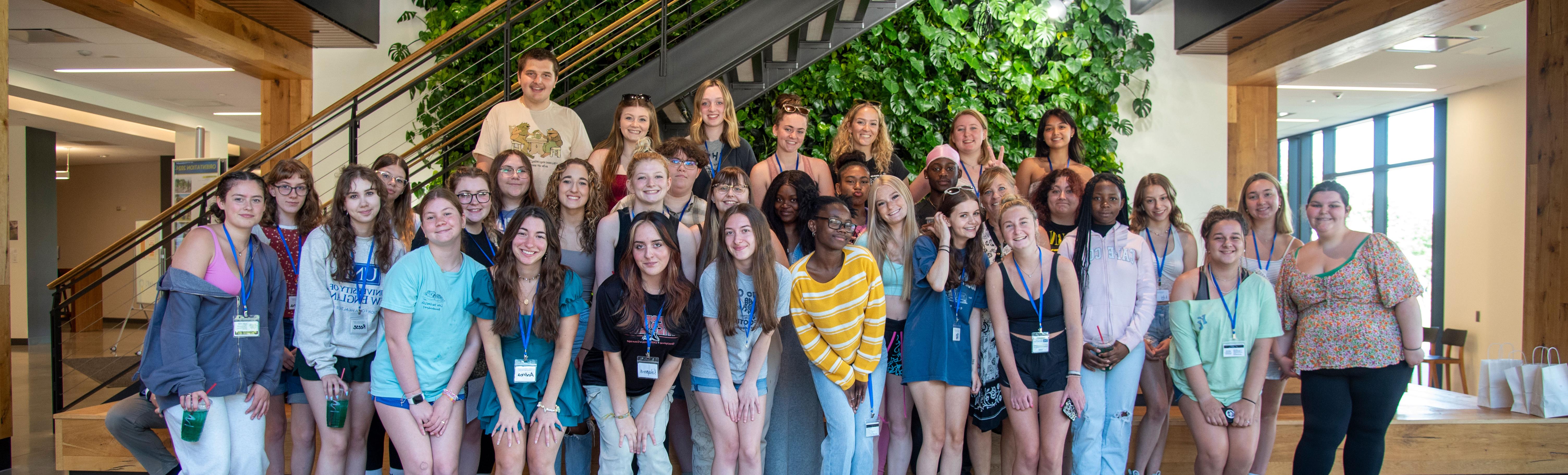 A group of high school students poses for a photo