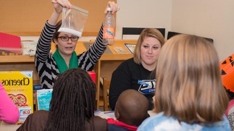 UNE students interact with children at Boys and Girls Club