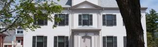 white brick building on u n e's portl和 campus